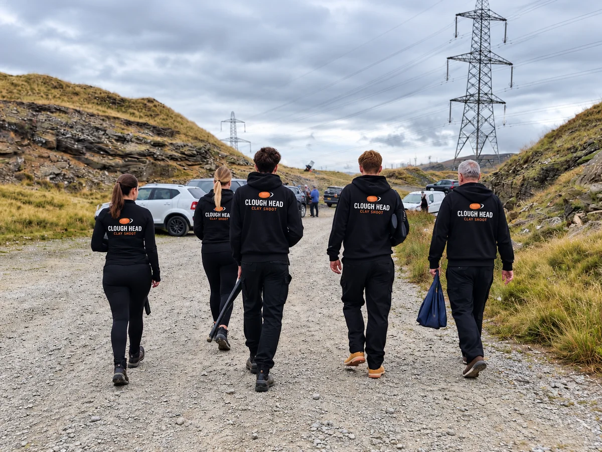 Group walking at Clough Head in branded clothing; digitally edited image